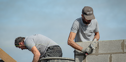Équipe de l'entreprise de construction maison Piron Construction sur chantier de maison moderne en Belgique