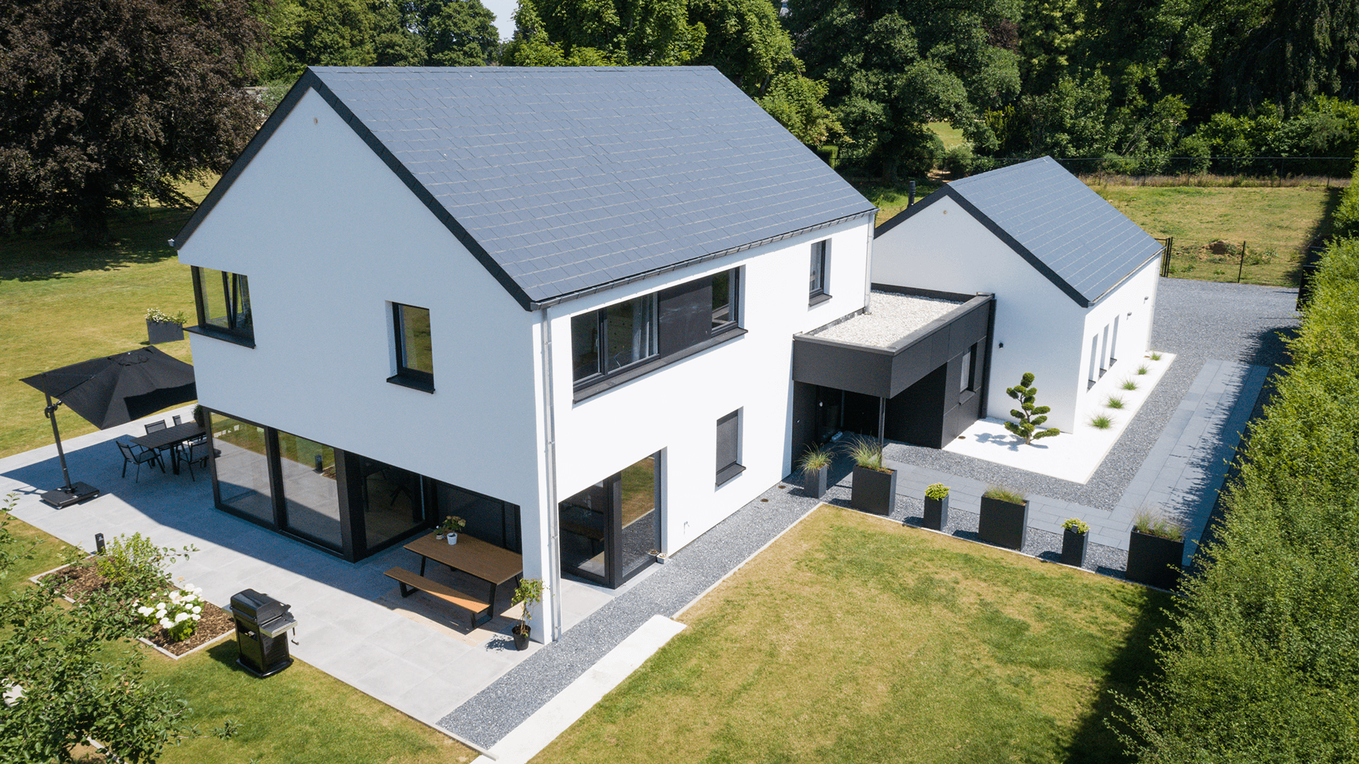 Maison clé sur porte moderne en Belgique construite sur mesure